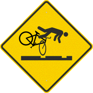 Bicycle road hazard warning sign